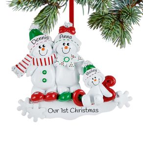 Snow Family Sled 3 Ornament